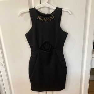 Fun, black dress with midriff cutout!